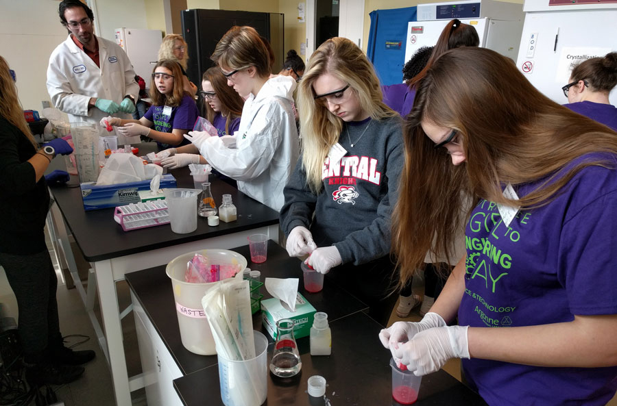 Students learn to extract DNA from strawberries using dishwashing liquid, rubbing alcohol and other household items.