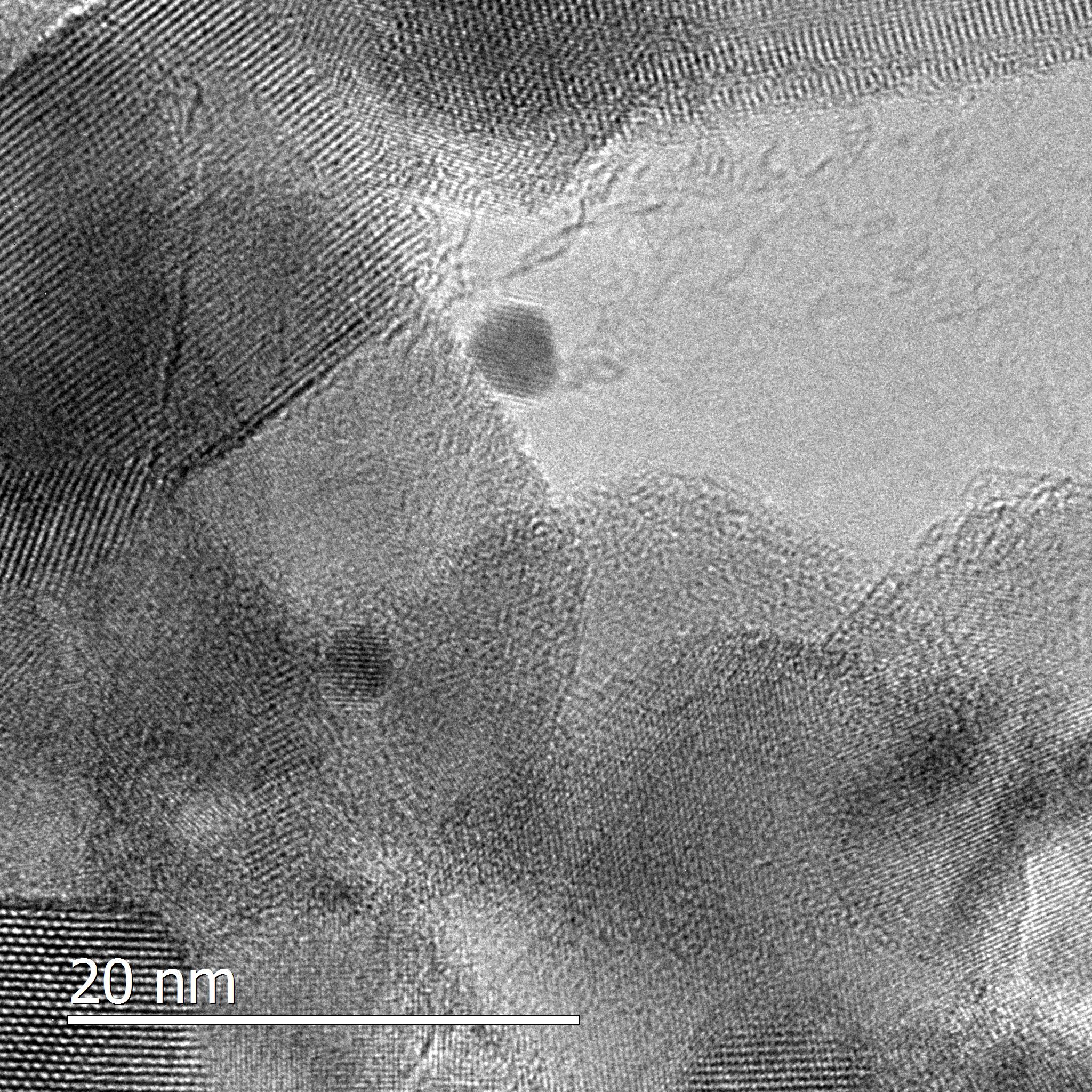 A high resolution transmission electron microscope produces a more detailed image of platinum spheres sitting on top of titanium dioxide. 