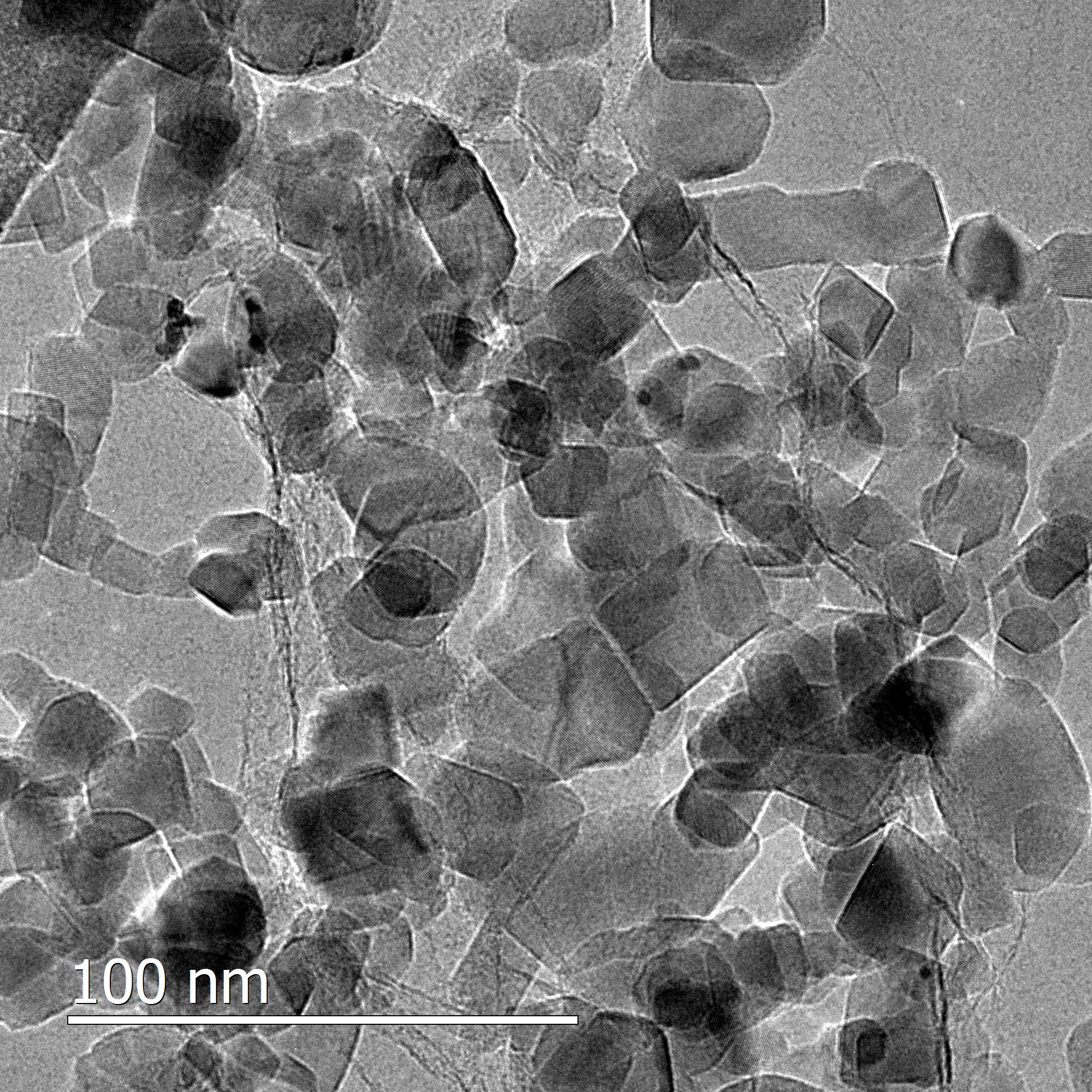 A transmission electron microscopic image of titanium dioxide plates resting on a near-invisible sheet of graphene.