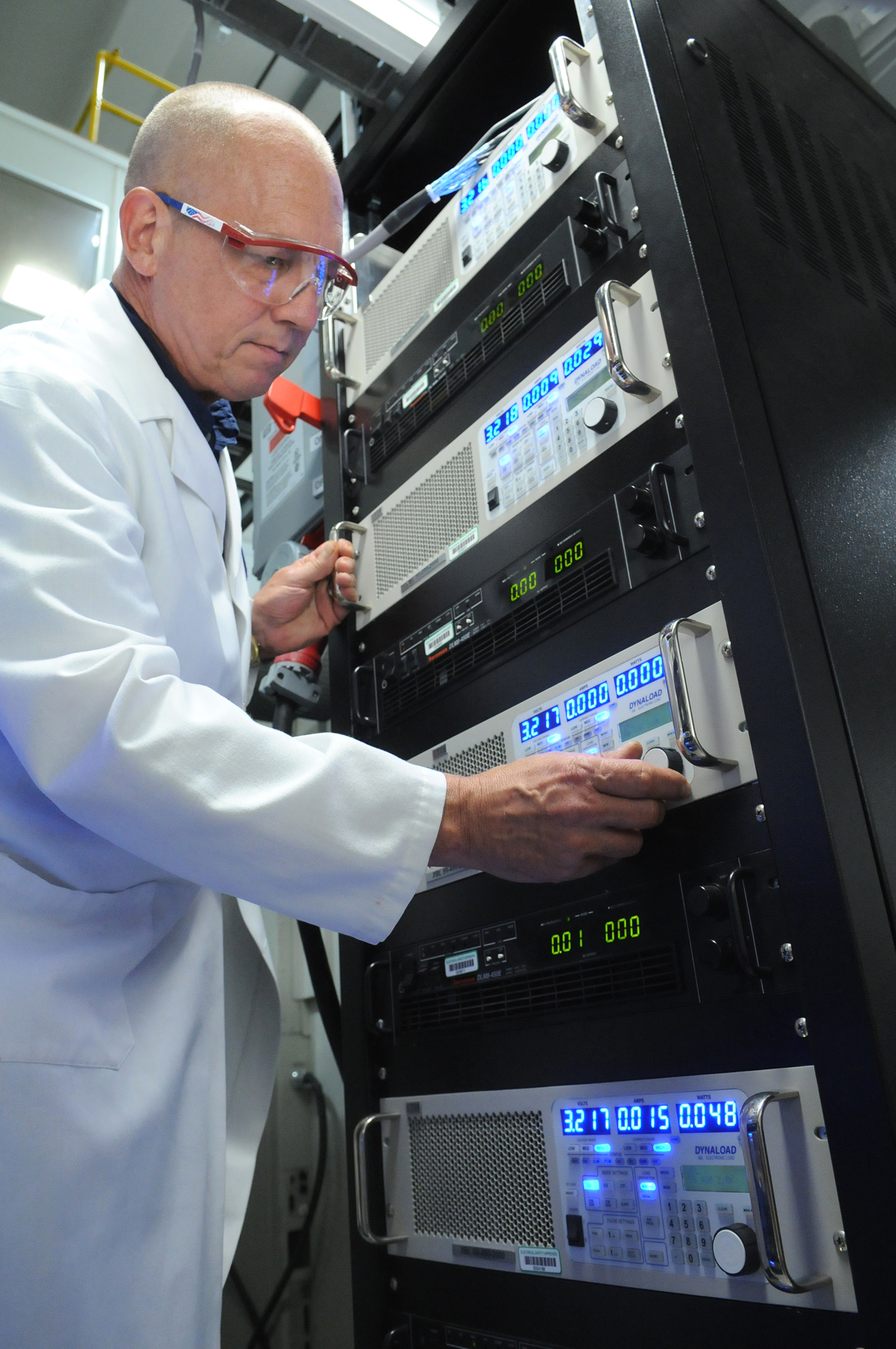 Researcher John Basco prepares for battery testing at Argonne's Elecrochemical Analysis and Diagnostics Laboratory.