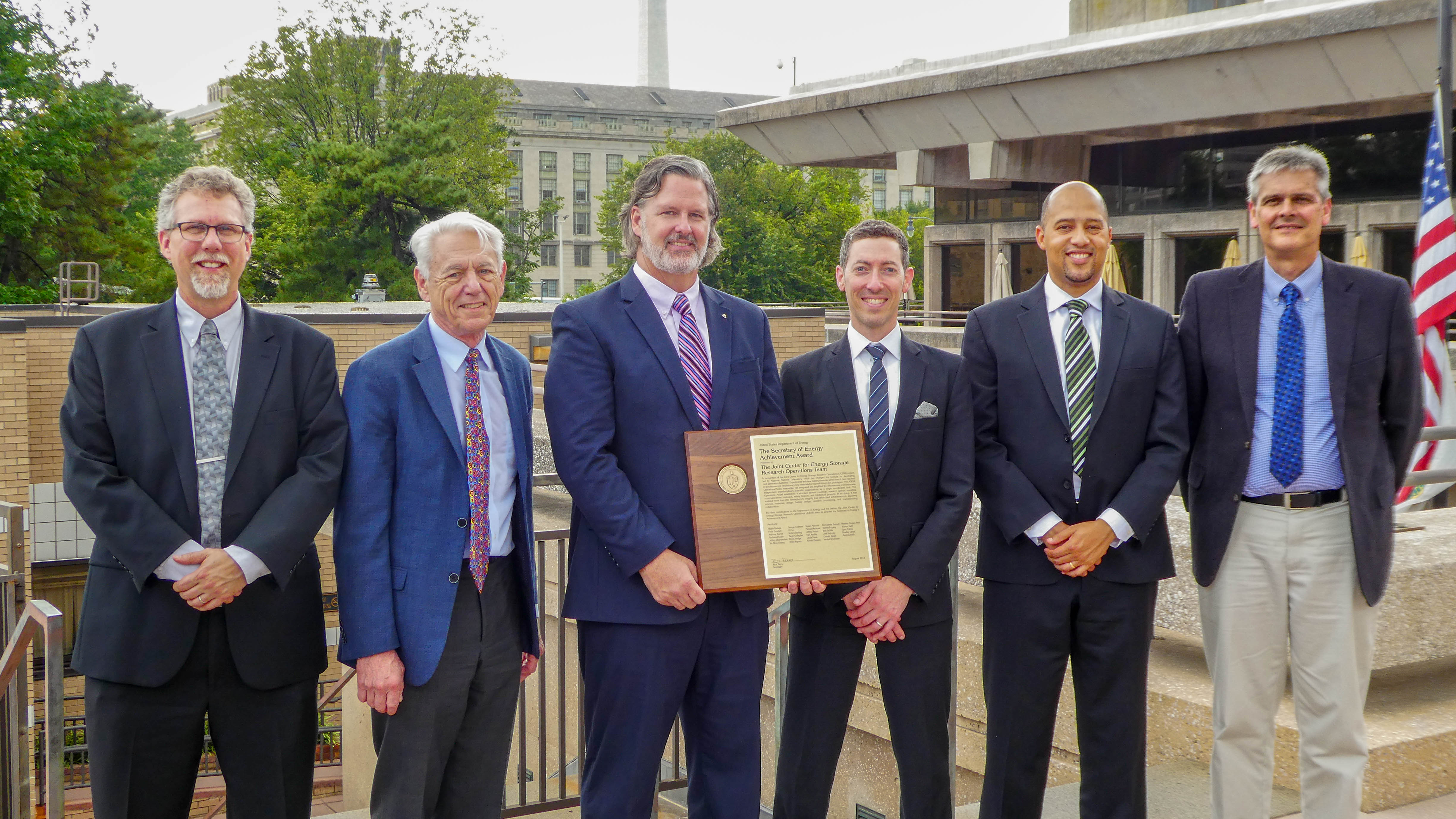 Karl Mueller, George Crabtree, Devin Hodge, Brian Ingram, Fikile Brushett and Kevin Zavadil accepted the Secretary of Energy’s Achievement Award on behalf of the 29 individuals who received the award.