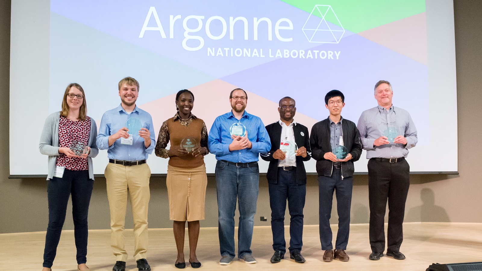 These seven students received awards for the best presentations at the end of Argonne’s two-week Modeling, Experimentation and Validation summer school. (Image by Argonne National Laboratory.)