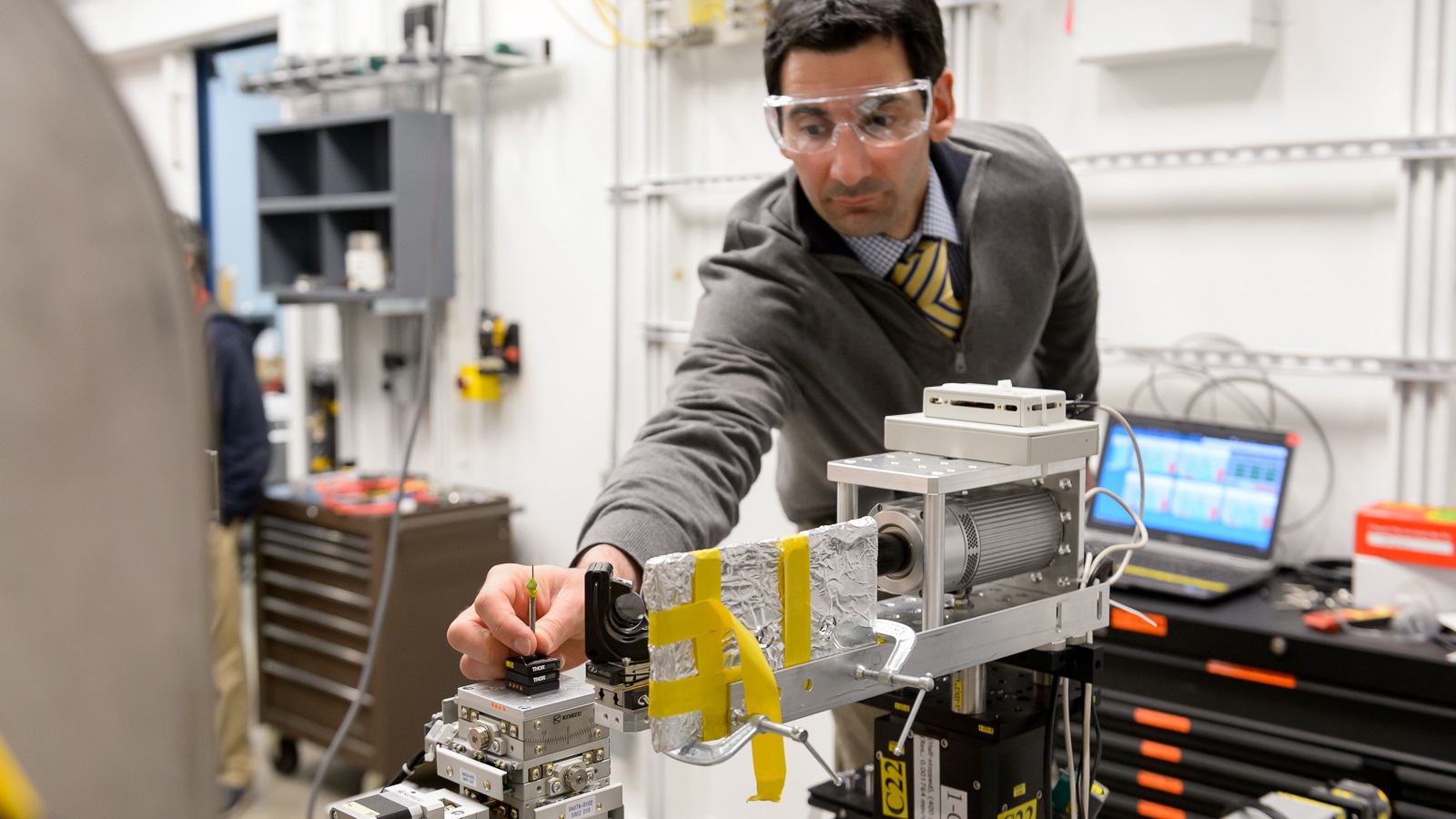 Michael Sangid of Purdue University installs a sample on the new high-throughput instrument installed at the 6-ID-D end-station of the Advanced Photon Source. Purdue joined four other institutions in making this new instrument a reality.