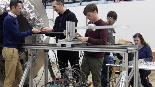 Students from Stony Brook University visited Argonne to test a prototype of a magnetic cloak.
