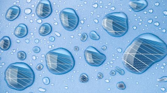 Illustration of water droplets on blue background