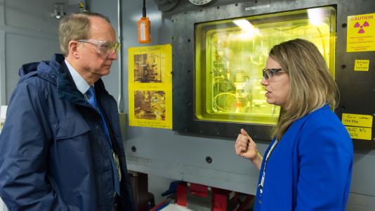 Argonne chemist Amanda Youker discusses the molybdenum-99 program, which supports nonproliferation goals, with Administrator Frank Klotz of the National Nuclear Security Administration.