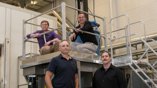 A recent Argonne study has called into question the existence of silicene, thought to be one of the world’s newest and hottest two-dimensional nanomaterials. Pictured are researchers (clockwise from bottom left) Nathan Guisinger, Andrew J. Mannix, Brian Kiraly and Brandon L. Fisher. Photo credit: Wes Agresta, Argonne National Laboratory.