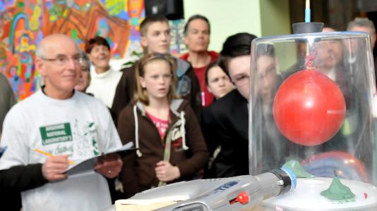 The crowd looks on as a machine is tested during the 2012 Rube Goldberg Contest at Navy Pier in Chicago.