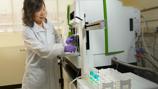 Analytical Chemist Yifen Tsai prepares a sample for analysis on the high-resolution ICP-Mass Spectrometer.