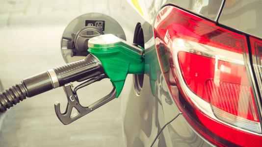 Using more biofuels and engines that handle them could potentially cut emissions and water use within three decades, according to a new Argonne-led study. (Image by Shutterstock / fewerton.)