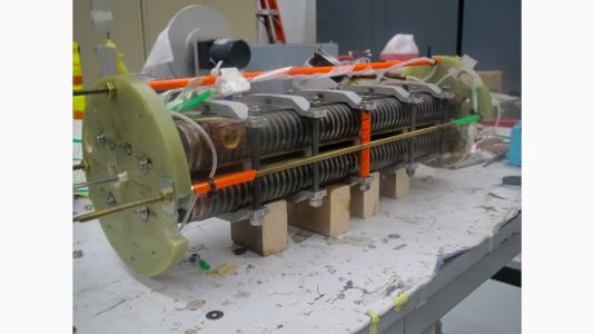 This half-meter-long prototype of a niobium-tin superconducting undulator magnet was designed and built by a team from three U.S. Department of Energy National Laboratories. The next step will be to build a meter-long version and install it at the Advanced Photon Source at Argonne. 
