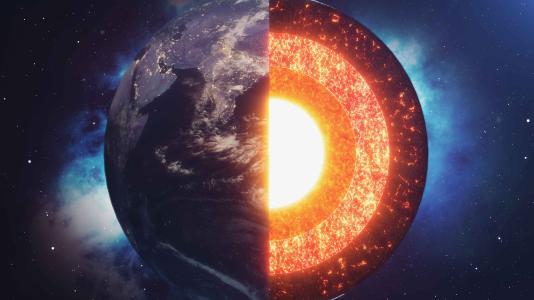 New research conducted at APS found that under the conditions present where Earth’s outer core (2nd ring from the center) meets the lower mantle (3rd ring from the center), water and metal combine to form diamonds. (Image by Shutterstock/ Rost9.)
