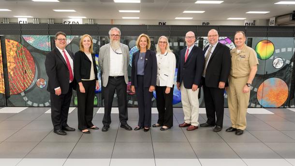 While visiting Argonne, Under Secretary Gordon-Hagerty toured the Advanced Leadership Computing Facility, which is the future home of Aurora, set to be the nation’s first exascale system. From left to right: Keith Bradley, Megan Clifford, Mike Papka, Lisa E. Gordon-Hagerty, Joanna Livengood, Pete Hanlon, John Stevens and Christopher Osborn. (Image by Argonne National Laboratory.)