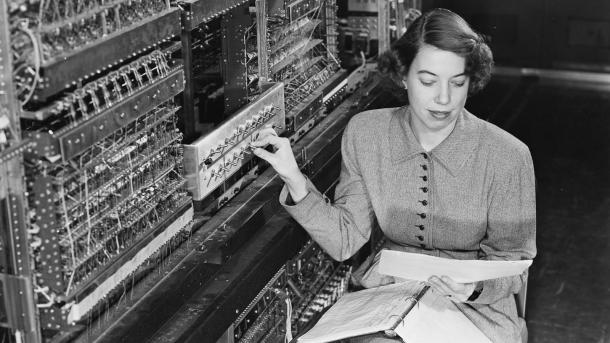 Woman sitting at switchboard.  (Image by Argonne National Laboratory.)