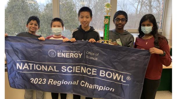 Students from Daniel Wright Junior High School celebrate winning the 2023 Illinois Regional Middle School Science Bowl.